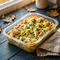 Huhn-Blumenkohl-Auflauf mit Erbsen & Zitronenfrische